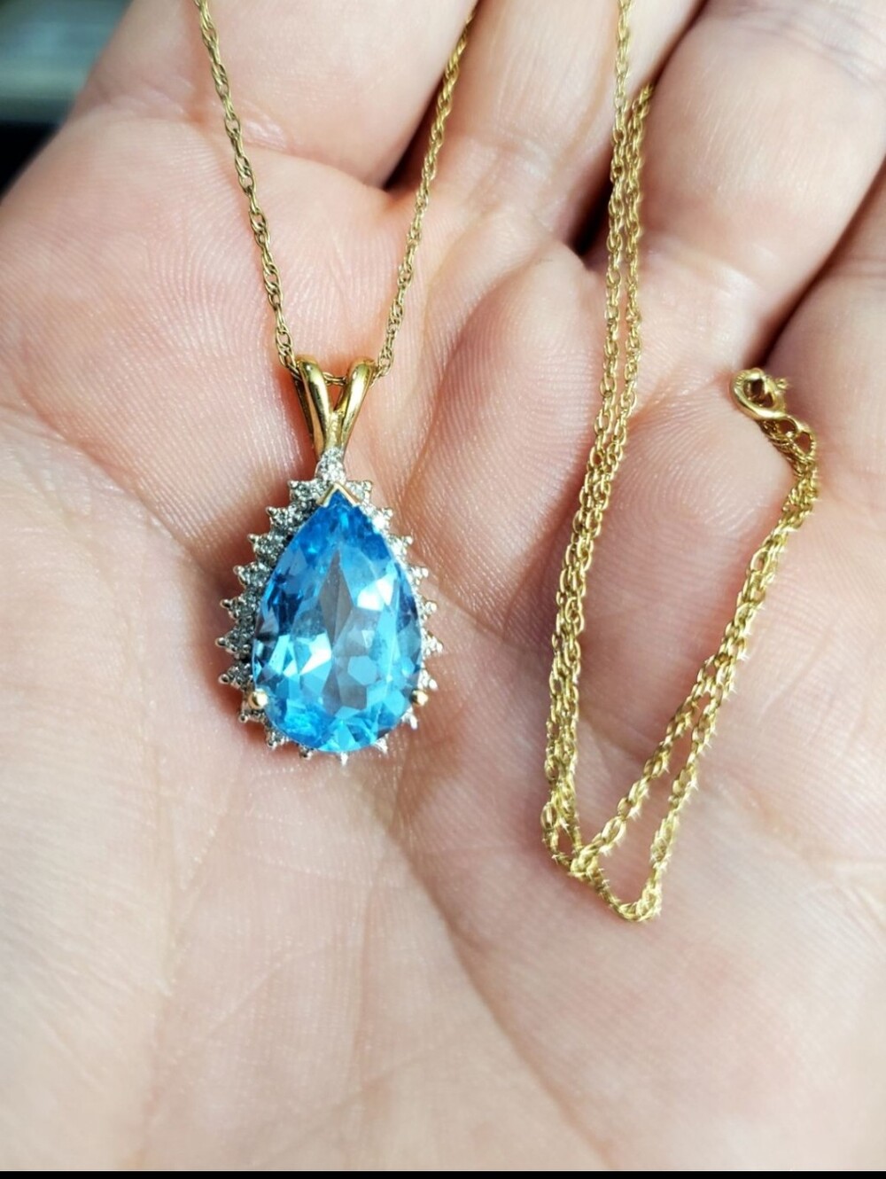 10k AMAZING blue topaz & diamond necklace! Pendant stamped 10kP which is plumb m